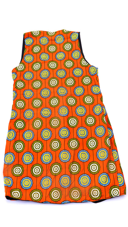Chaleco largo reversible confeccionado con tela africana Ankara en tonos naranja y azul, hecho en Ecuador